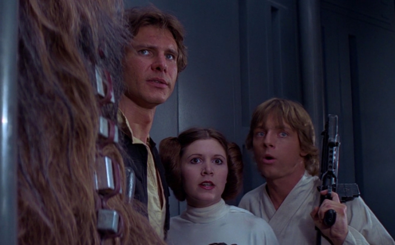 Luke Skywalker, Leia Organa, Han Solo şi Chewbacca, în Star Wars (A New Hope)